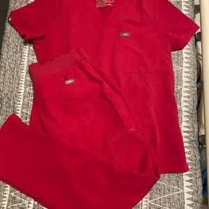 Hot pink size small figs scrubs.